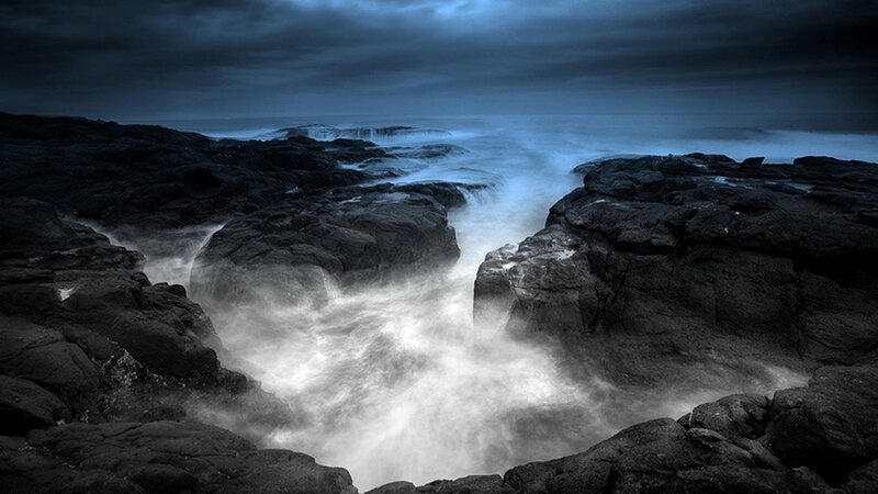 Ocean waves crashing on rocks
