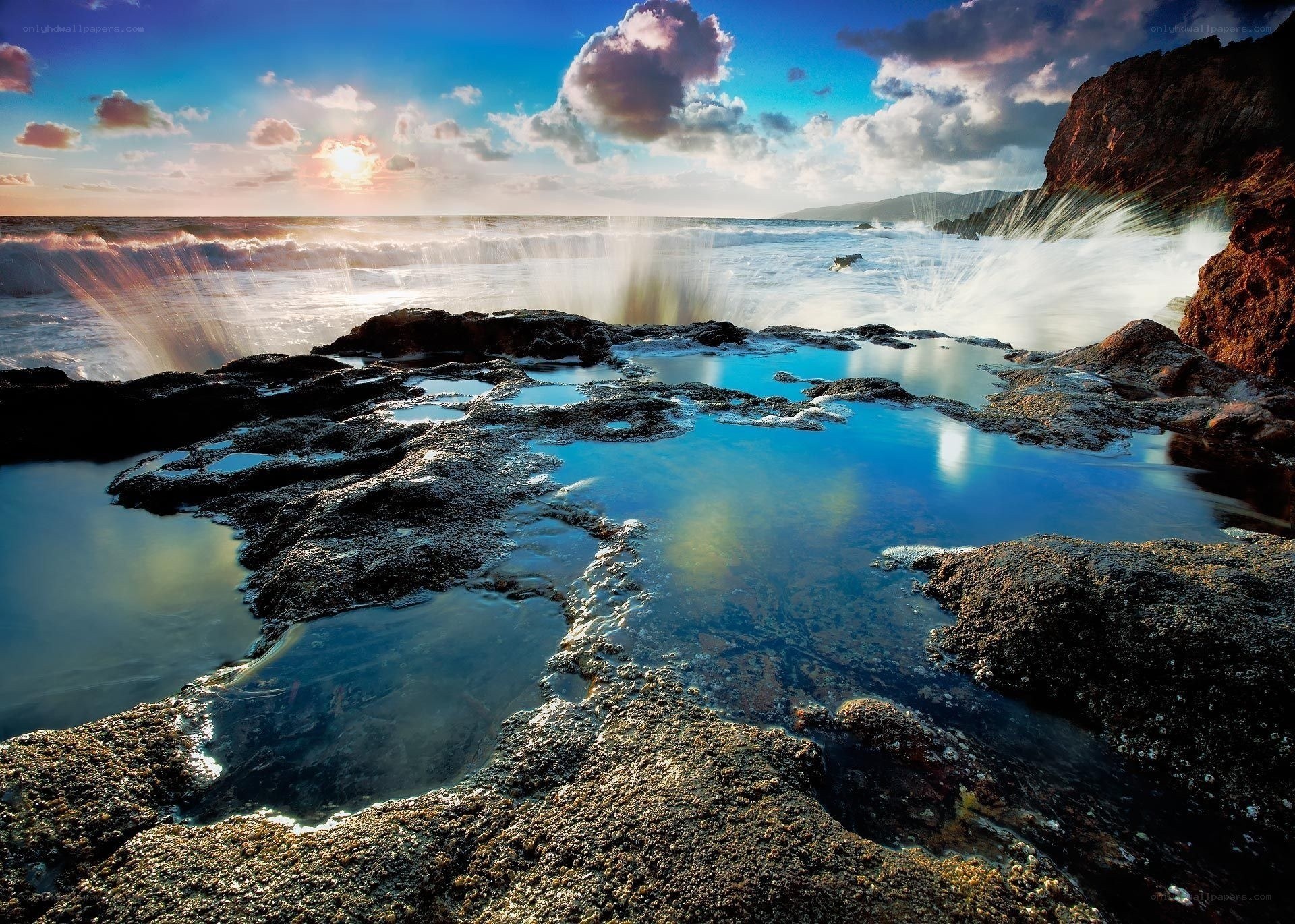 Ocean waves crashing on rocks