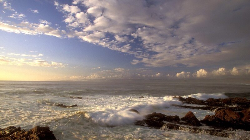 Ocean waves crashing on rocks