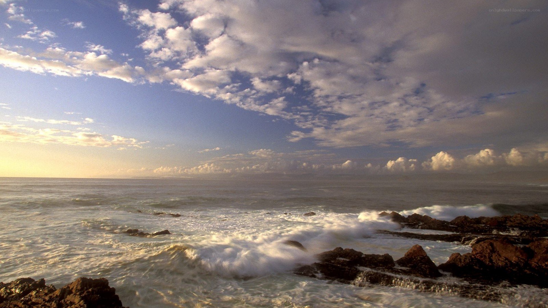Ocean waves crashing on rocks