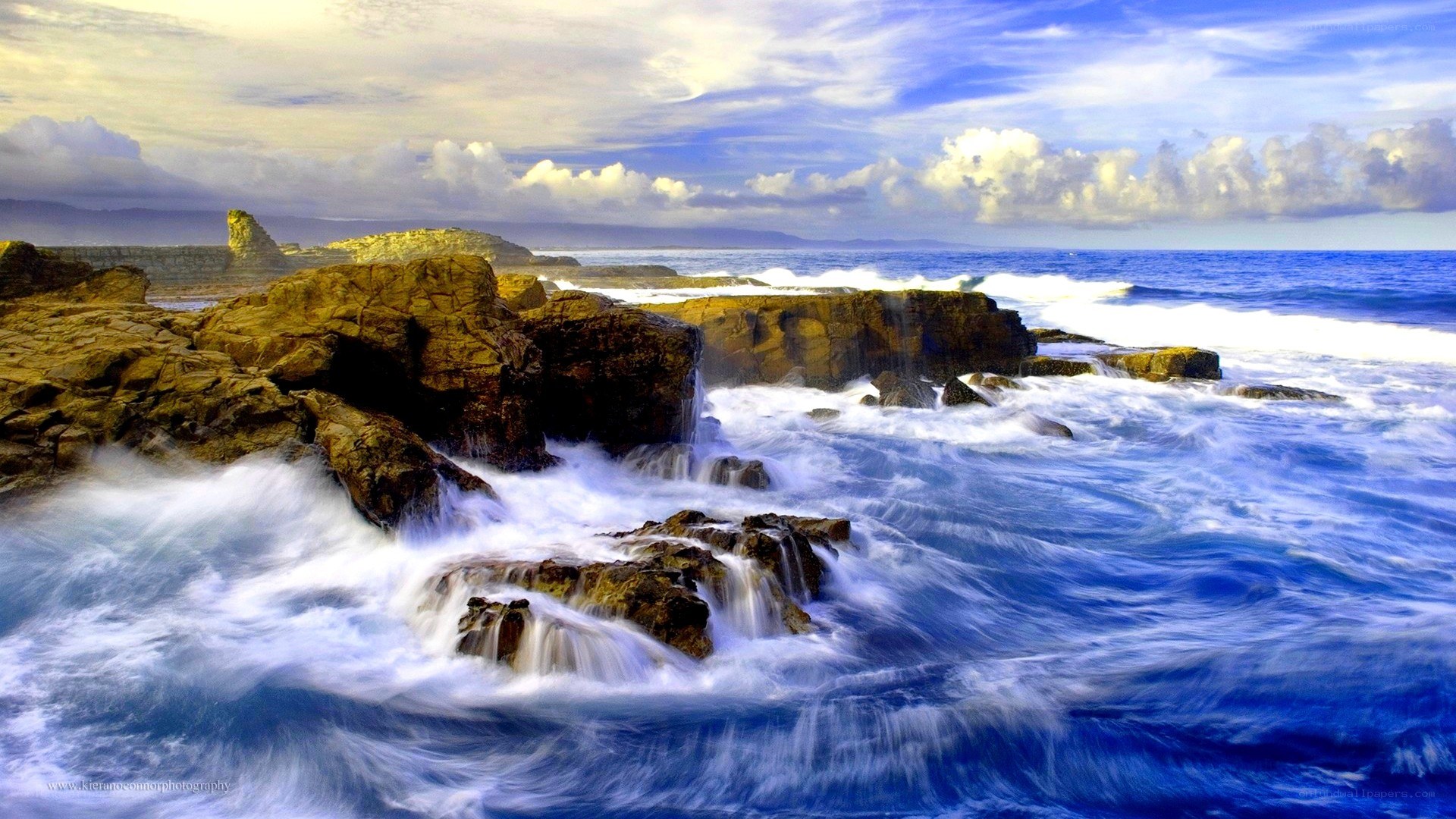 Ocean waves crashing on rocks