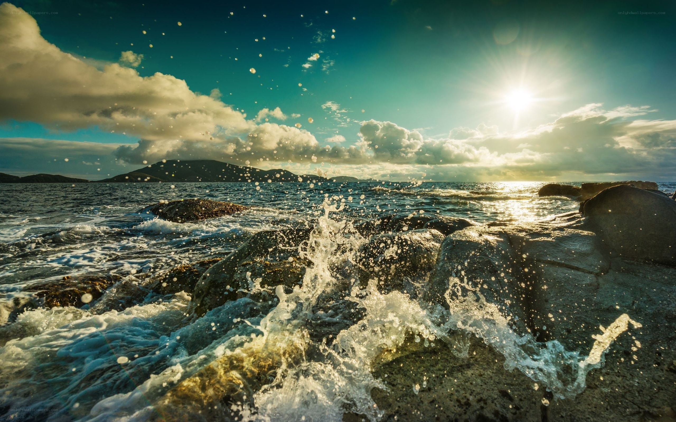 Ocean waves crashing on rocks