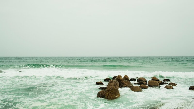 Ocean waves crashing on rocks