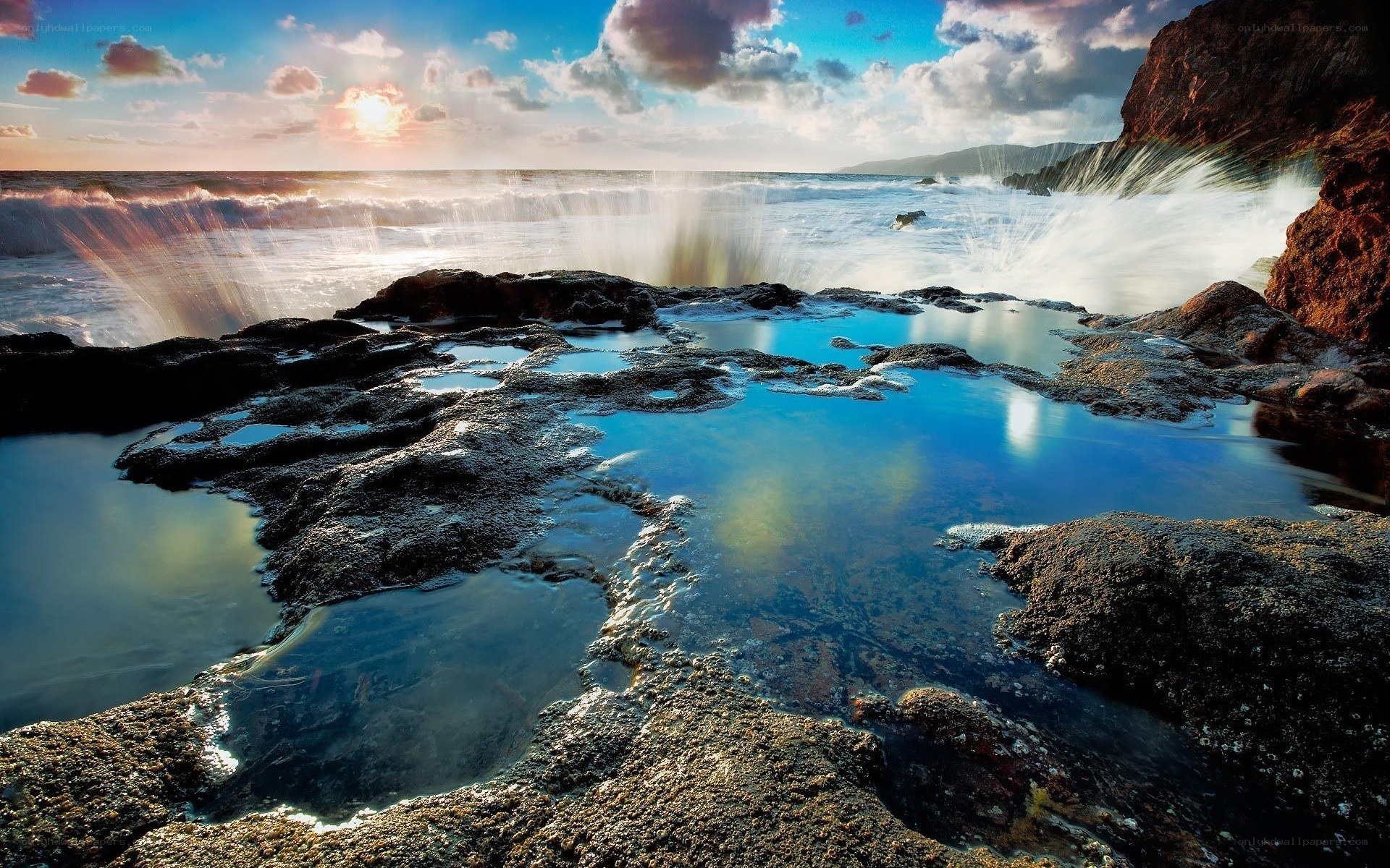 Ocean waves crashing on rocks