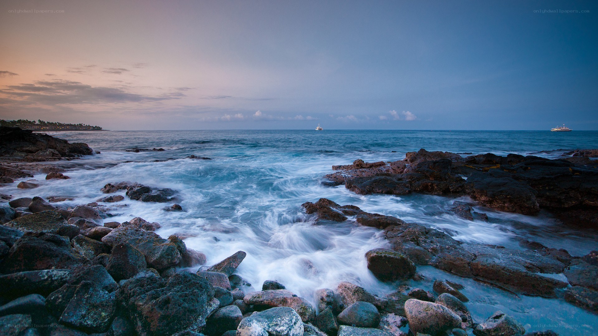Ocean waves crashing on rocks