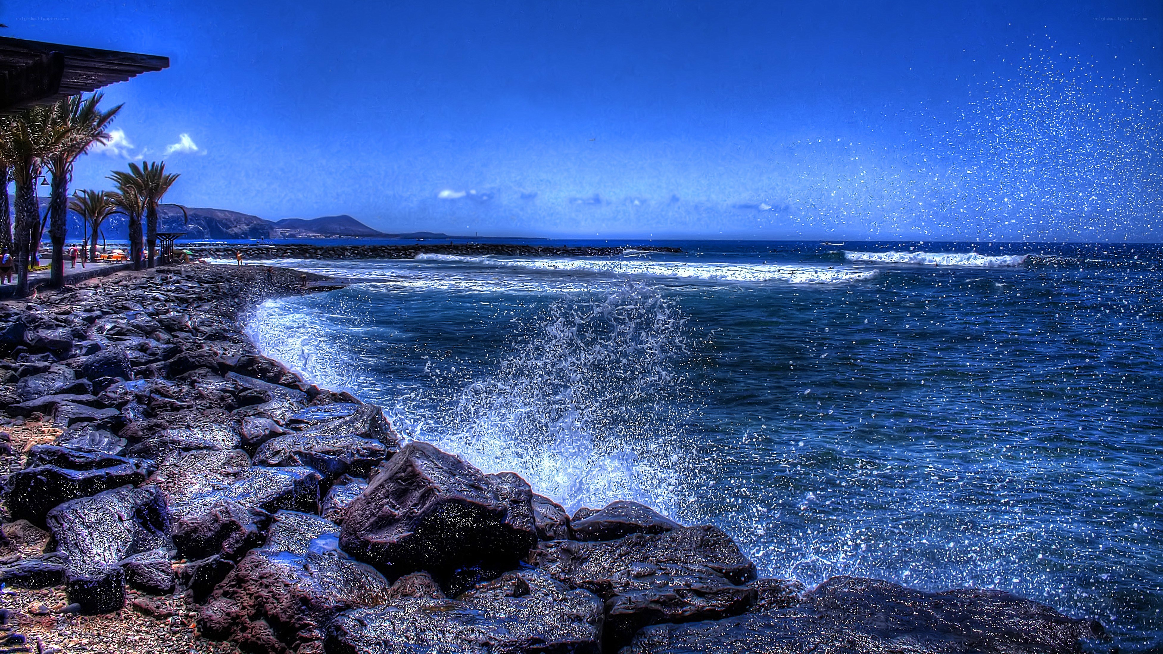 Ocean waves crashing on rocks