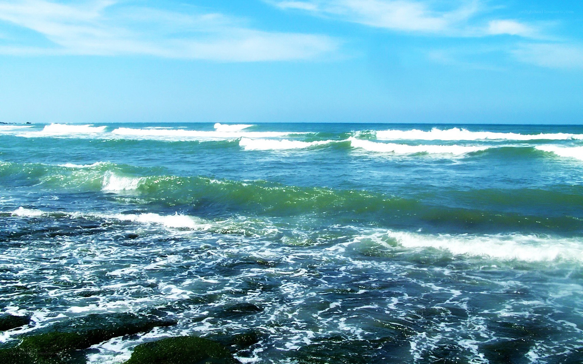 Ocean waves crashing on rocks