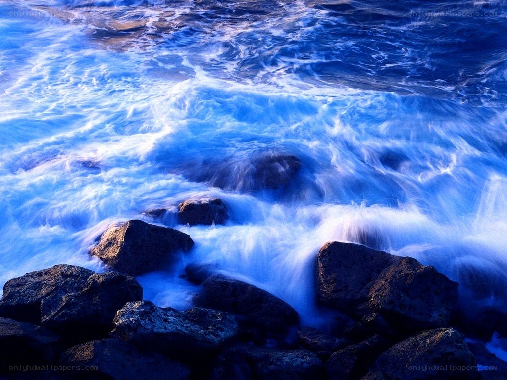Ocean waves crashing on rocks