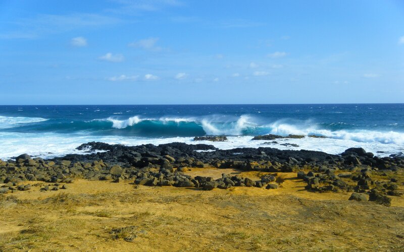 Ocean Waves Crashing on Rocks — Blue, Dramatic, Daytime