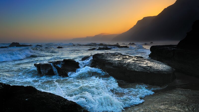 Ocean Waves Crashing on Rocks — Blue, Dramatic, Sunset, Photograph, Mountain, Sky