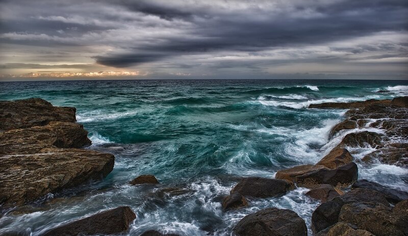 Ocean Waves Crashing on Rocks — Blue, Dramatic, Sunset, Photograph