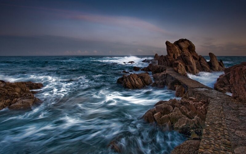 Ocean Waves Crashing on Rocks — Blue, Dramatic, Sunset