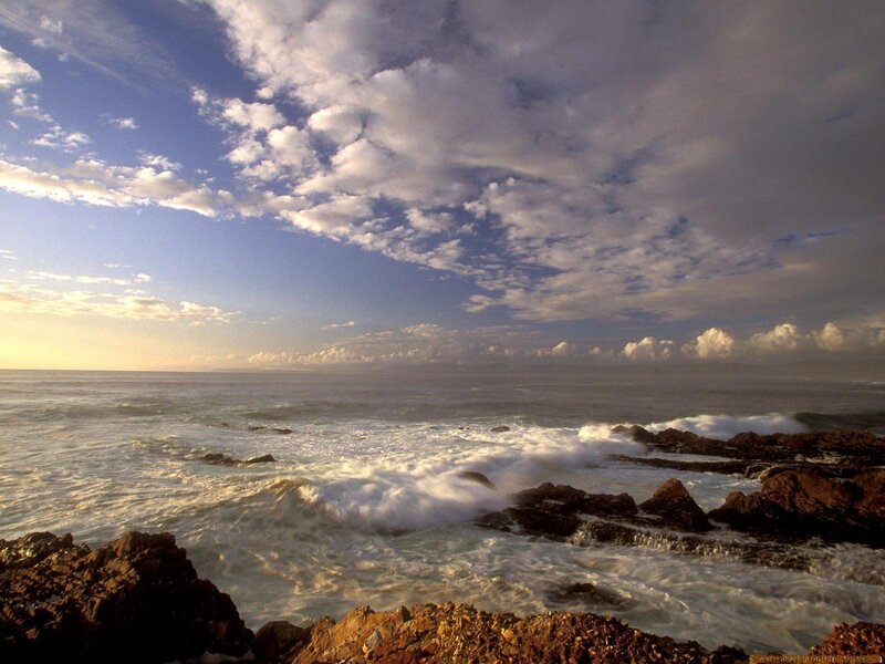 Ocean Waves Crashing on Rocks — Blue