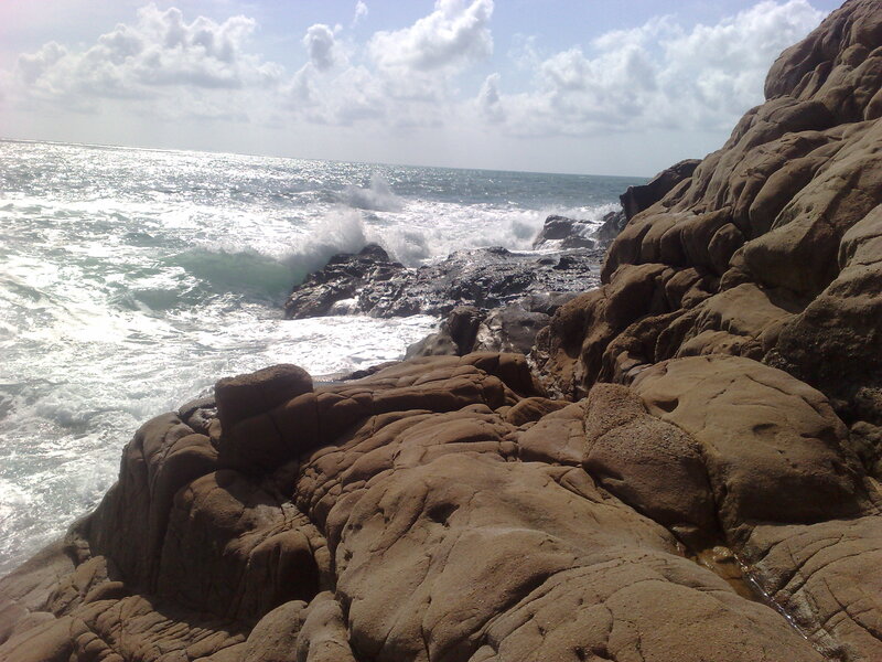 Ocean Waves Crashing on Rocks — Brown