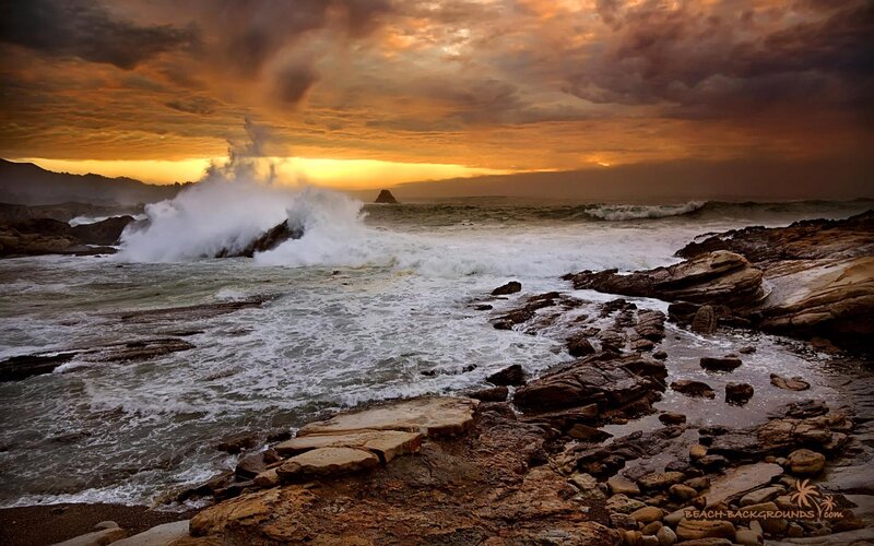 Ocean Waves Crashing on Rocks — Orange, Dramatic, Sunset, Photograph, Clouds