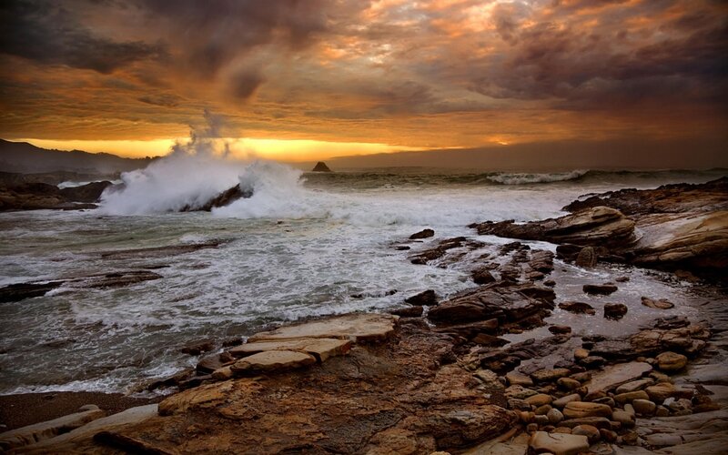 Ocean Waves Crashing on Rocks — Orange, Dramatic, Sunset, Photograph