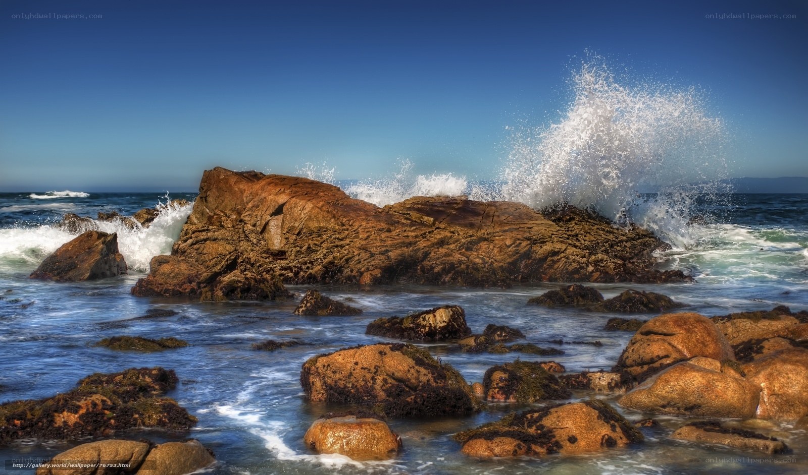 Ocean waves crashing on rocks
