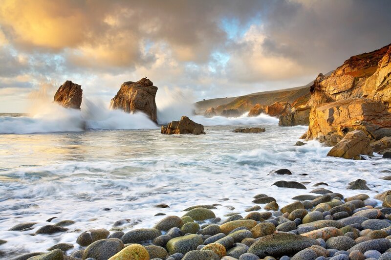 Ocean waves crashing on rocky shore