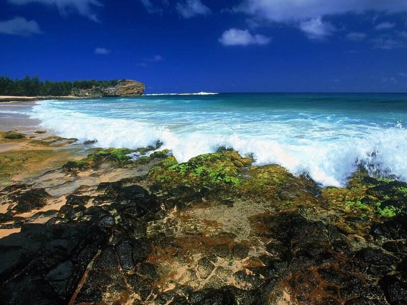 Ocean waves crashing on rocky shore