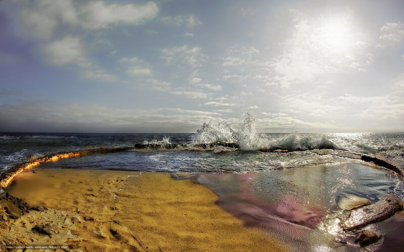 Ocean waves crashing on rocky shore