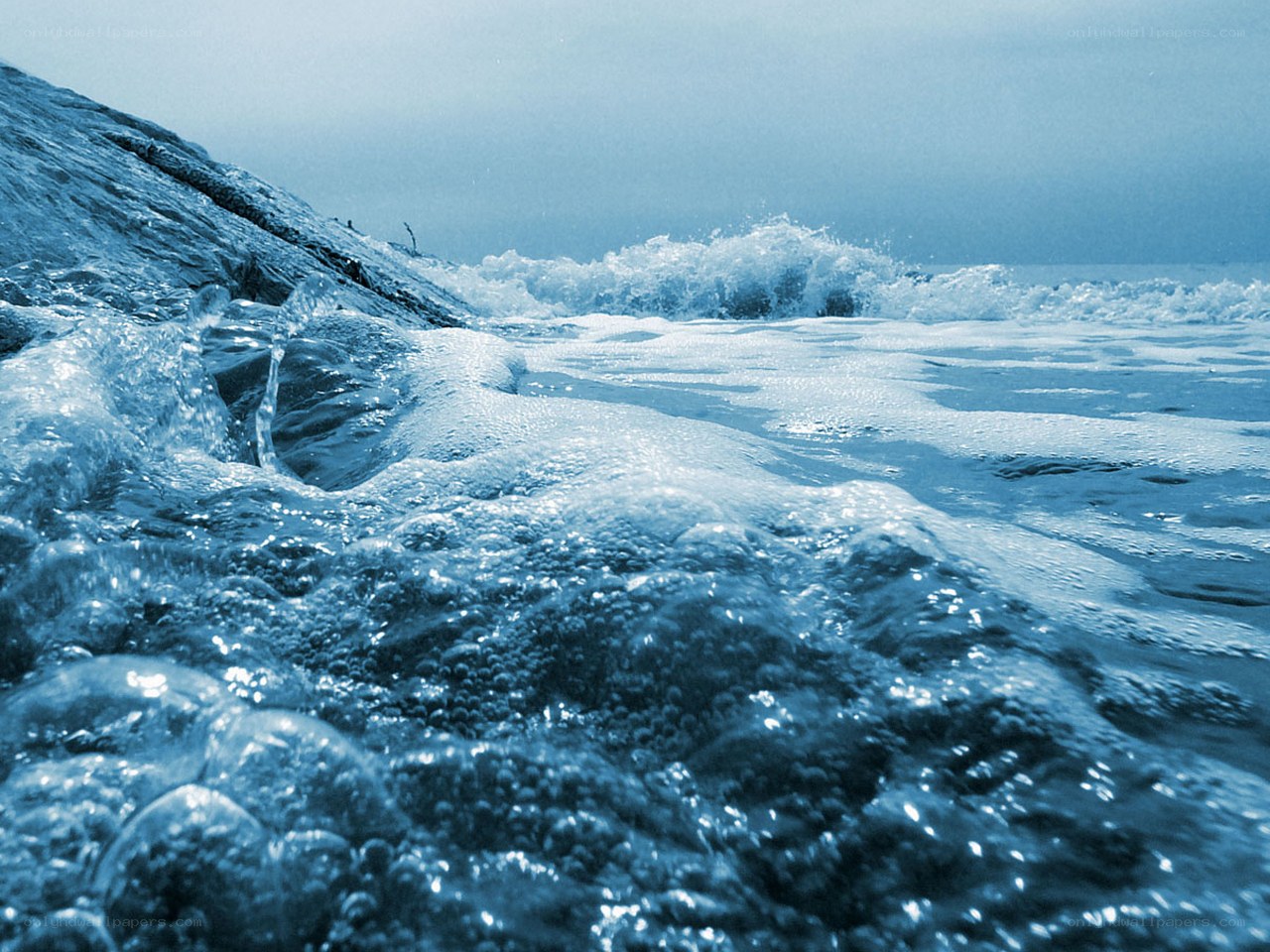 Ocean waves crashing on shore