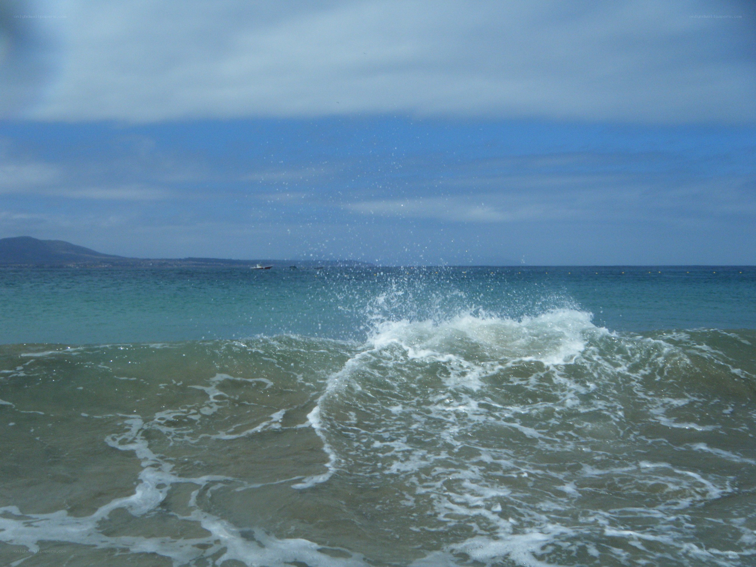 Ocean waves crashing on shore