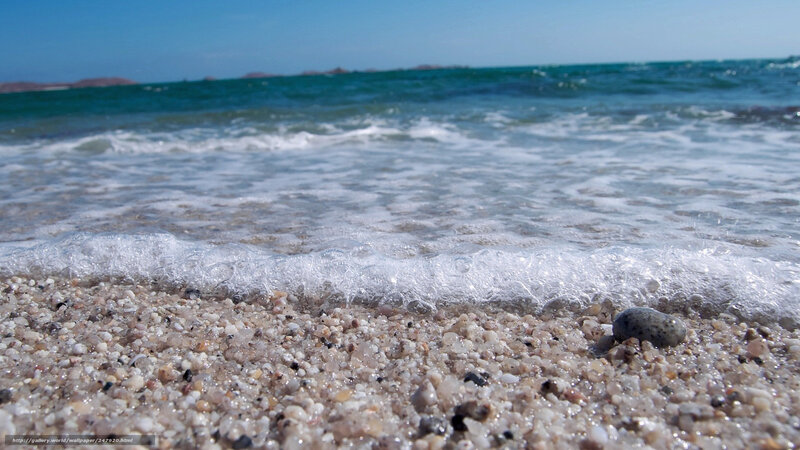 Ocean waves on a pebble beach