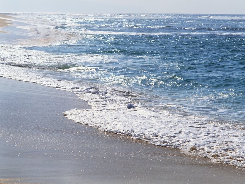 Ocean waves on a sandy beach