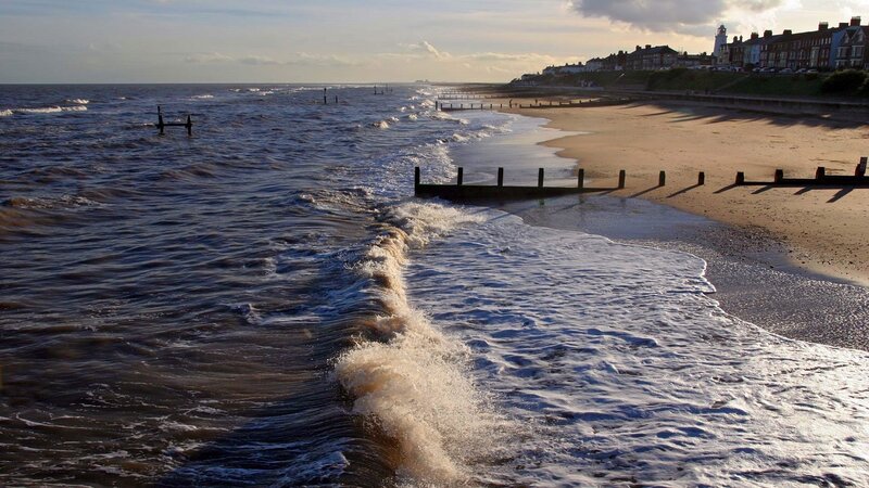 Ocean Waves on Beach — Blue, Calm, Sunset, Photograph, Sea Wall