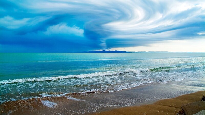 Ocean Waves on Beach — Blue, Dramatic, Afternoon, Photograph, Clouds, Mountains, Sand