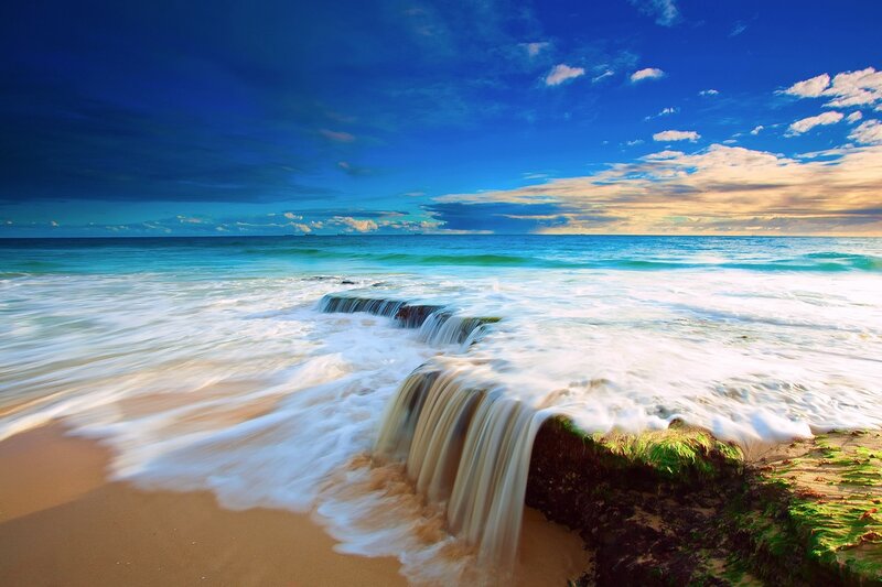 Ocean Waves on Beach — Blue, Serene, Sunset, Photograph, Sand, Rocks