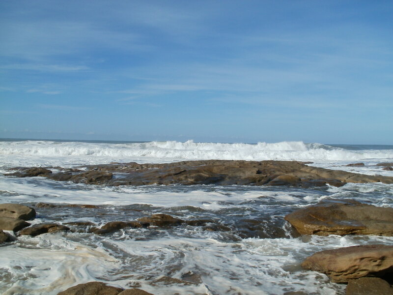 Ocean Waves on Rocks — Blue, Calm, Afternoon