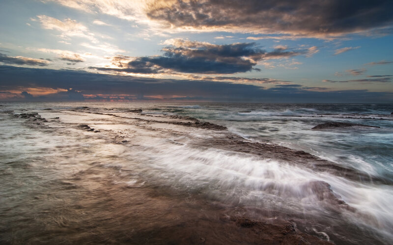 Ocean Waves on Rocks — Blue, Dramatic, Sunset, Photograph, Clouds, Sky, Sea