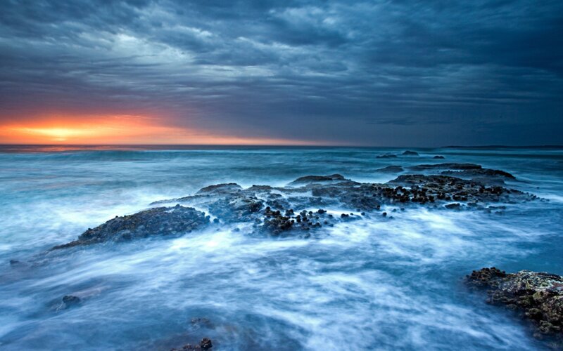 Ocean Waves on Rocks — Blue, Dramatic, Sunset, Photograph, Sky, Sun