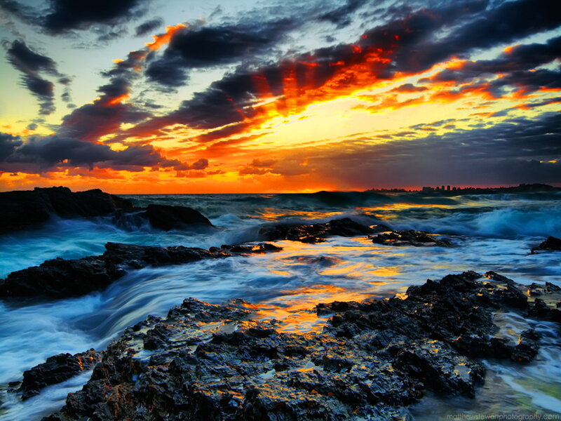Ocean Waves on Rocks — Orange, Dramatic, Sunset, Photograph, Sky, City Skyline