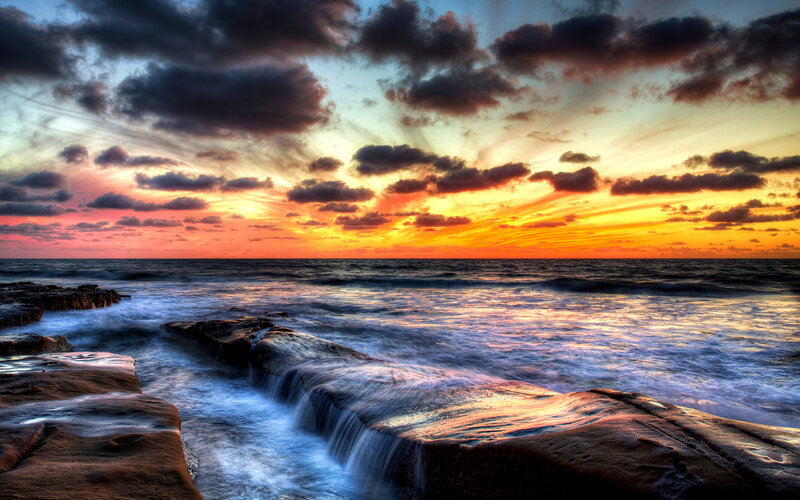 Ocean Waves on Rocks — Orange, Dramatic, Sunset, Photograph, Sky, Clouds, Sea