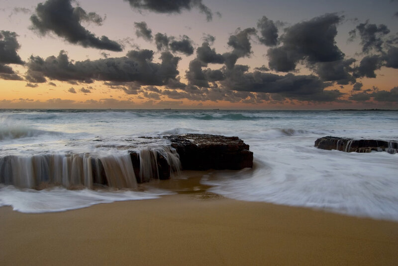 Ocean Waves on Rocks — Orange, Dramatic, Sunset
