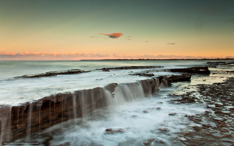 Ocean Waves on Rocks — Orange, Serene, Sunset