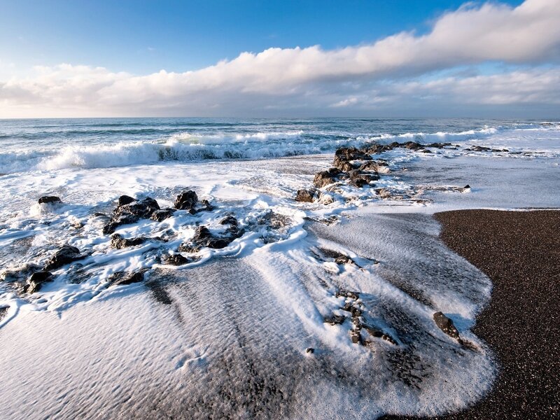 Ocean waves on rocky beach