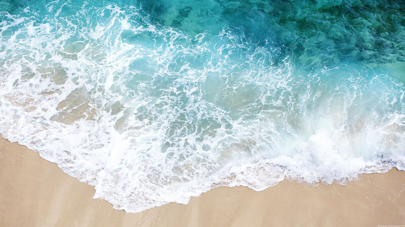 ocean waves on sandy beach