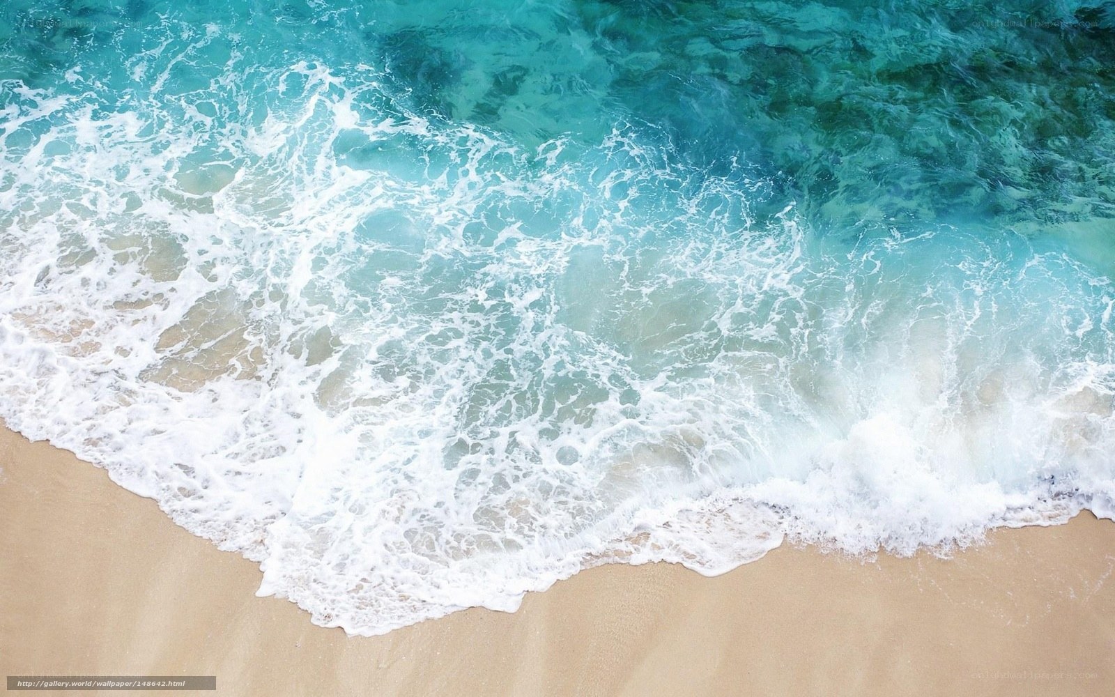 ocean waves on sandy beach