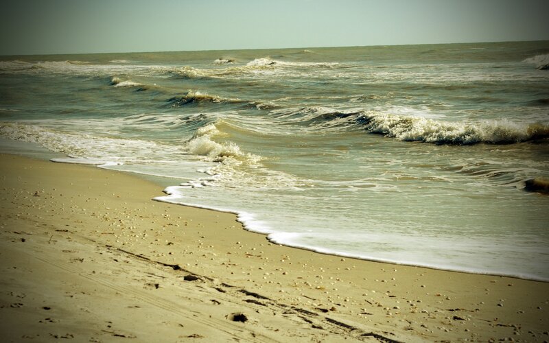 Ocean Waves on Sandy Beach — Beige