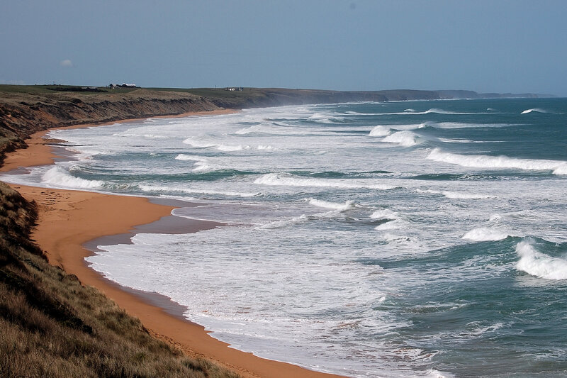 Ocean Waves on Sandy Beach — Blue, Calm, Afternoon, Photograph, Cliffs