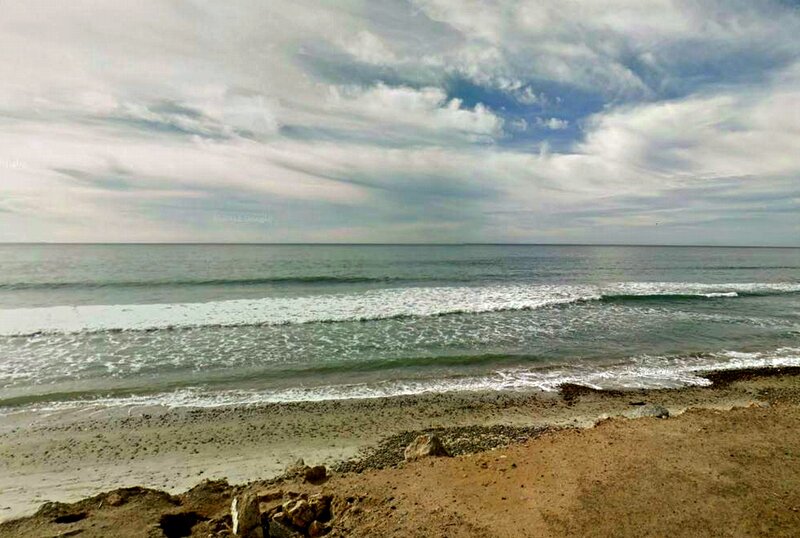 Ocean Waves on Sandy Beach — Blue, Calm, Afternoon, Photograph, Sand, Rocks