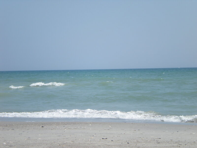 Ocean Waves on Sandy Beach — Blue, Calm, Afternoon, Photograph, Sand, Sky, White