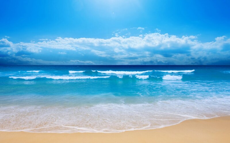 Ocean Waves on Sandy Beach — Blue, Serene, Afternoon, Photograph, Sand, Clouds, Sun, White, Yellow