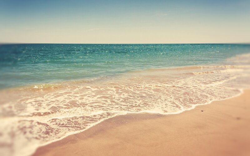 Ocean Waves on Sandy Beach — Sky