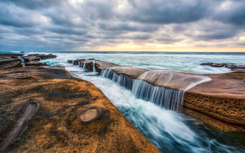 Ocean Waves over Rocks
