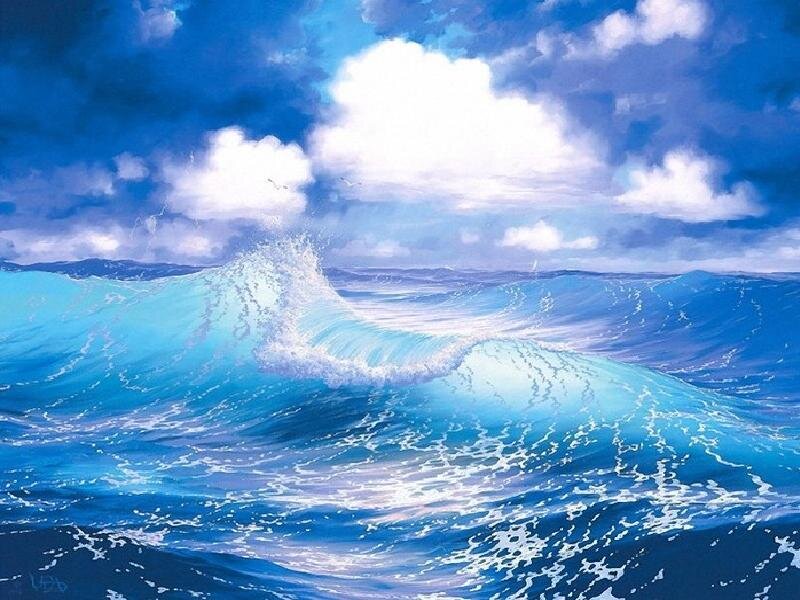 Ocean waves under cloudy sky