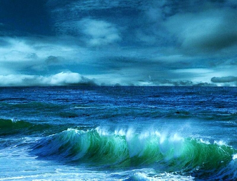 Ocean waves under stormy sky